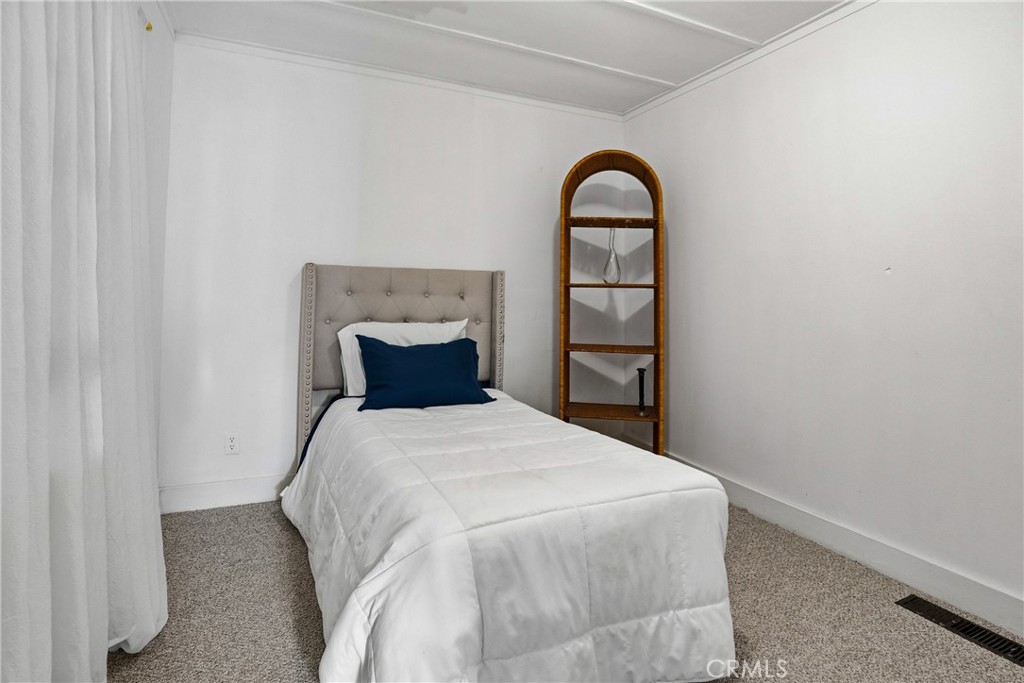 6701 East Zayante Road Felton, CA 95018 - Photo 34 of 44 a bedroom with a bed and a window