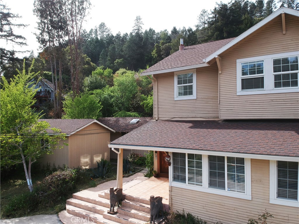 6701 East Zayante Road Felton, CA 95018 - Photo 44 of 44 a front view of a house with a yard