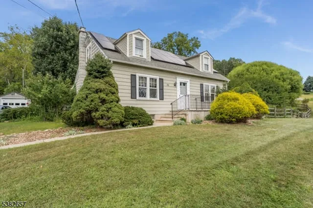 a house view with a garden space