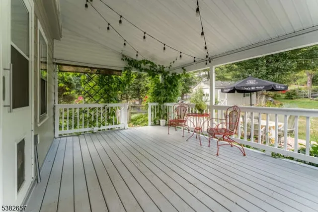 a view of a chairs on the roof deck