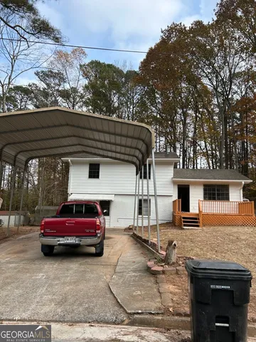 a car parked in front of a house