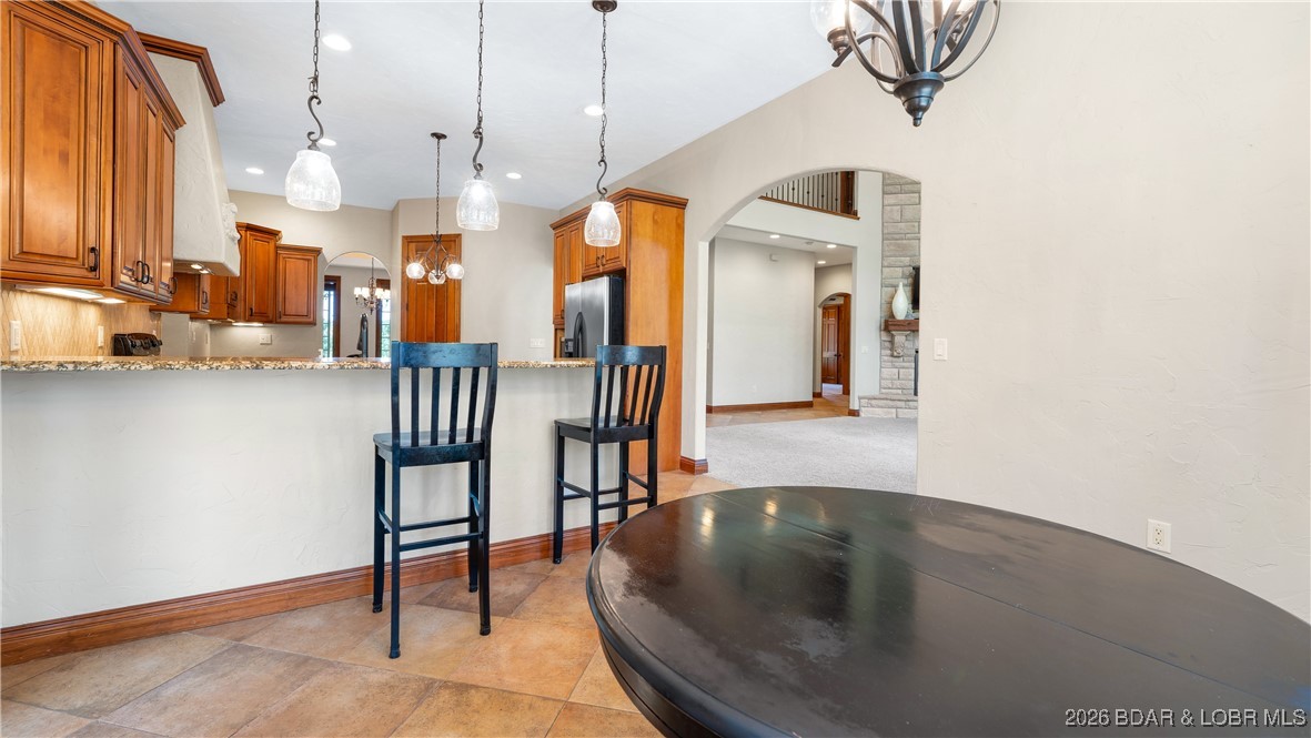 5745 Tree Leaf Court Osage Beach, MO 65065 - Photo 12 of 49 Breakfast nook by patio