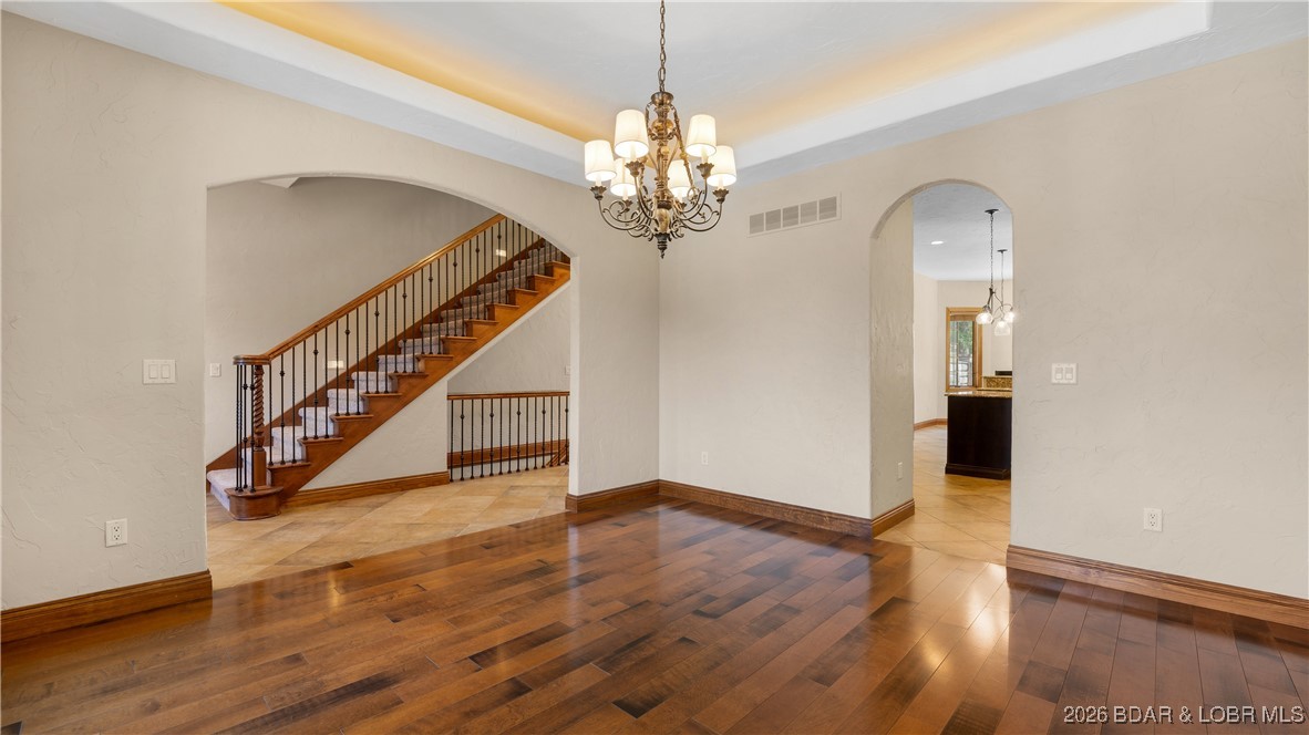 5745 Tree Leaf Court Osage Beach, MO 65065 - Photo 15 of 49 Formal dining room between entry and kitchen