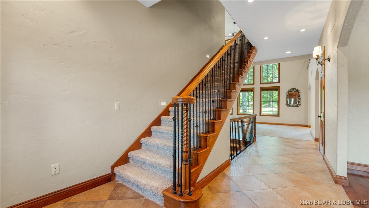 5745 Tree Leaf Court Osage Beach, MO 65065 - Photo 16 of 49 Stairwell to upper and lower level