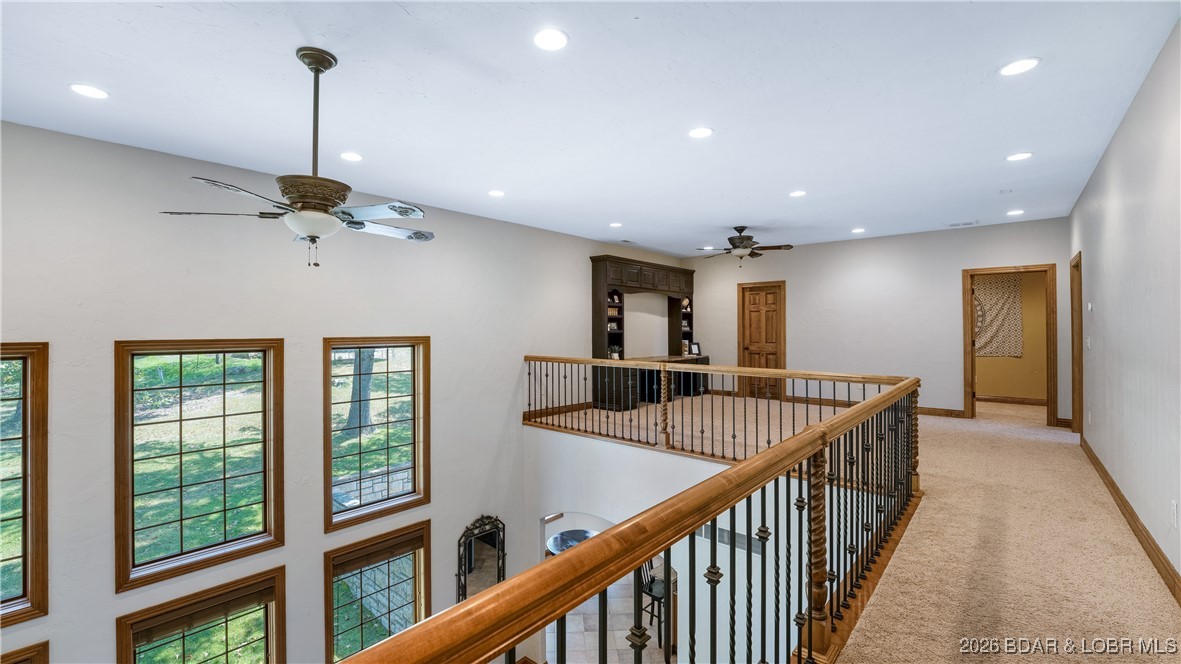 5745 Tree Leaf Court Osage Beach, MO 65065 - Photo 18 of 49 Catwalk looking towards 2 of 3 living spaces