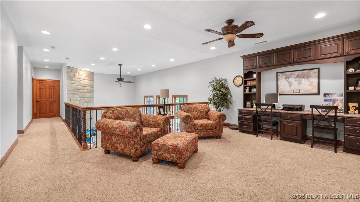 5745 Tree Leaf Court Osage Beach, MO 65065 - Photo 20 of 49 What the upper living space could look like furnis