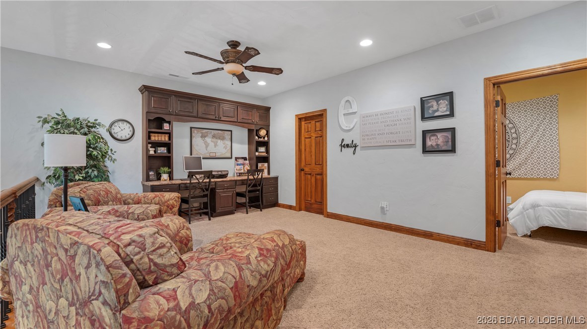 5745 Tree Leaf Court Osage Beach, MO 65065 - Photo 21 of 49 What the upper living space could look like furnis