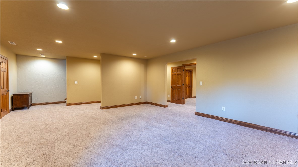 5745 Tree Leaf Court Osage Beach, MO 65065 - Photo 29 of 49 Lower level family room