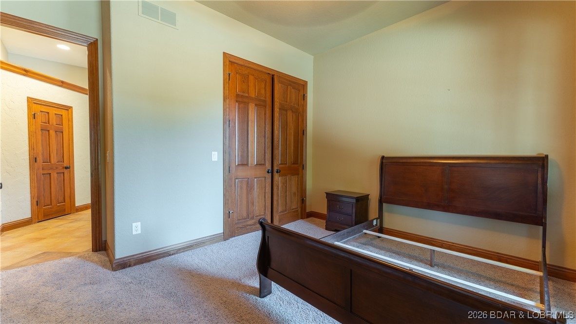 5745 Tree Leaf Court Osage Beach, MO 65065 - Photo 34 of 49 Bedroom 2 on main level