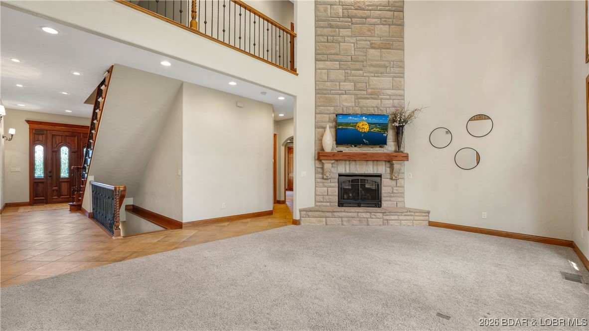 5745 Tree Leaf Court Osage Beach, MO 65065 - Photo 9 of 49 Floor to ceiling gas fireplace
