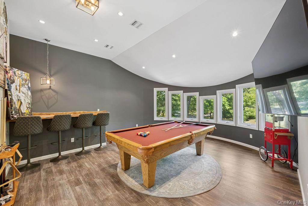 30 Lone Oak Path Smithtown, NY 11787 - Photo 24 of 39 a living room with furniture and large windows