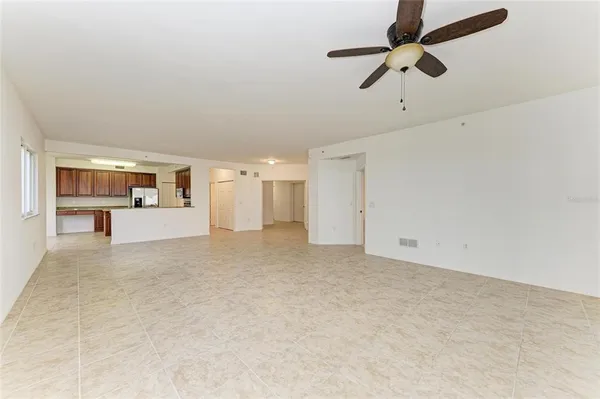 a kitchen with stainless steel appliances granite countertop a stove sink microwave and cabinets