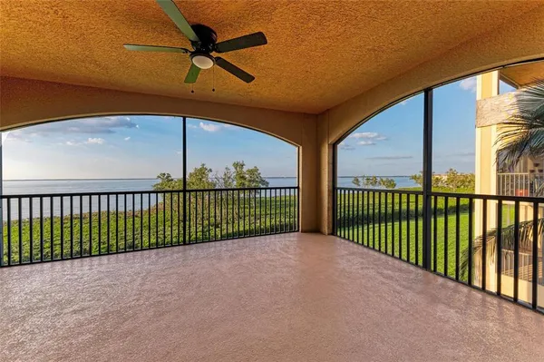 a view of a chairs and tables in the patio