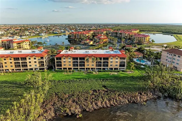a view of swimming pool with outdoor seating and yard