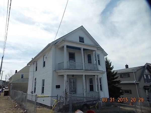 77 Langley Street Fall River, MA 02720 - Photo 1 of 10 a large brick building with many windows