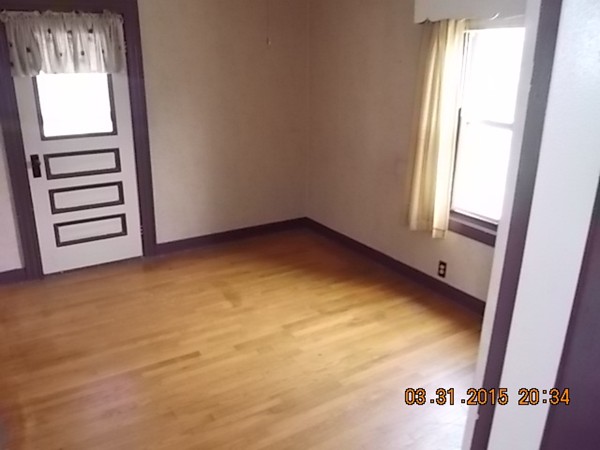 77 Langley Street Fall River, MA 02720 - Photo 10 of 10 an empty room with windows