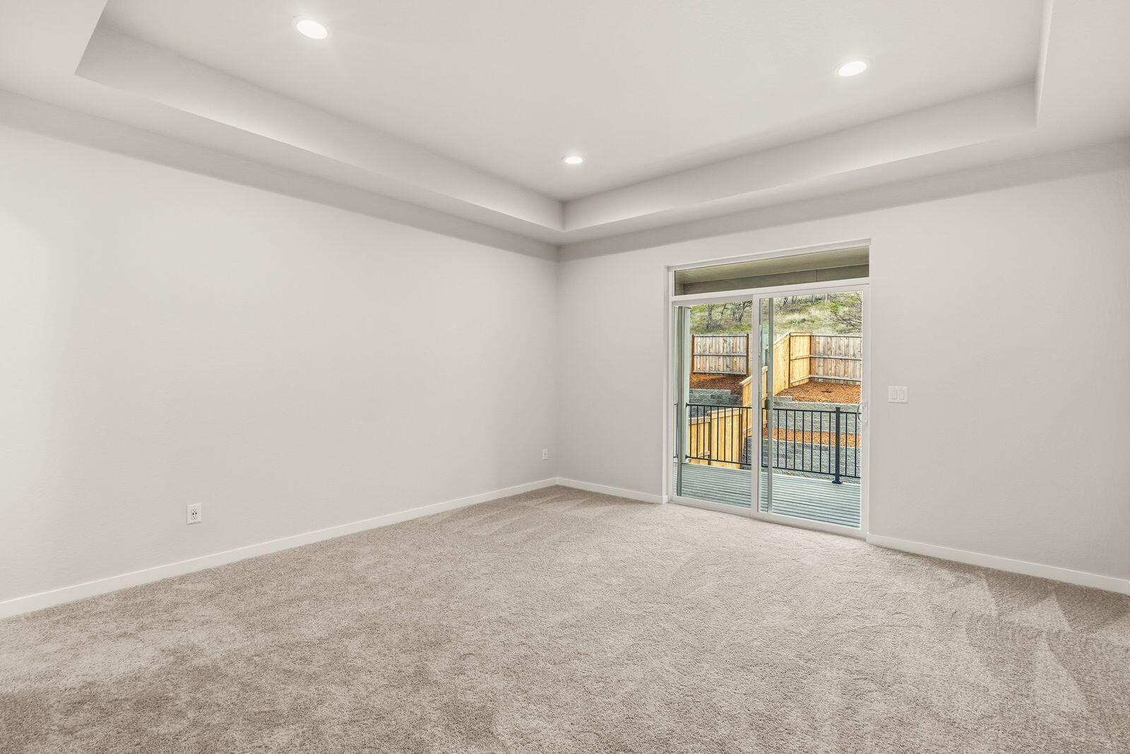 669 Old Waverly Way, Unit 20 Eagle Point, OR 97524 - Photo 13 of 32 an empty room with windows
