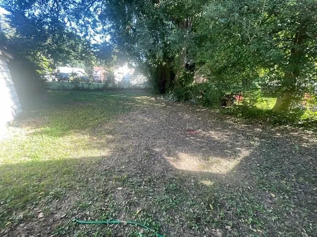 a view of outdoor space and yard