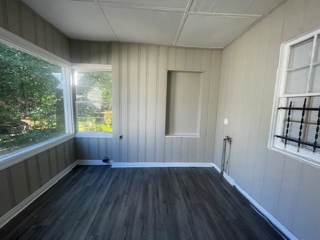 754 McConnell Street Memphis, TN 38112 - Photo 6 of 16 wooden floor in an empty room with a window