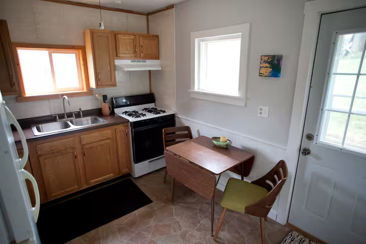 707 Monroe Street Oregon, IL 61061 - Photo 3 of 8 a room with storage and windows