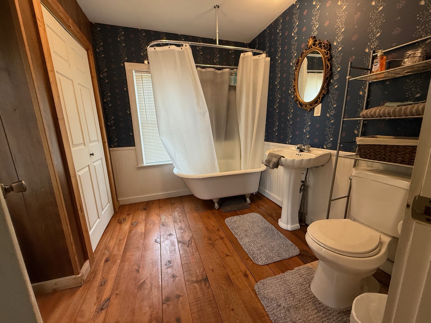 707 Monroe Street Oregon, IL 61061 - Photo 8 of 8 a bathroom with a toilet and a shower