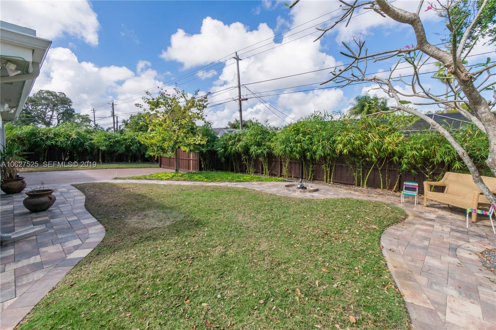 3339 West Park Road Hollywood, FL 33021 - Photo 22 of 28 a view of a garden with a slide