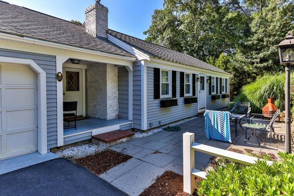 a view of house with patio outdoor seating