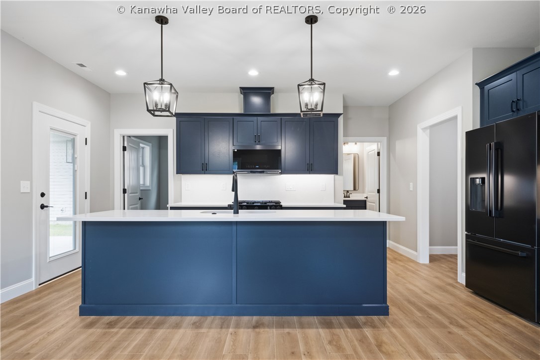 105 Ruffner Circle Fraziers Bottom, WV 25082 - Photo 4 of 47 Gorgeous Navy Cabinets/Upgraded Stainless Black Appiances