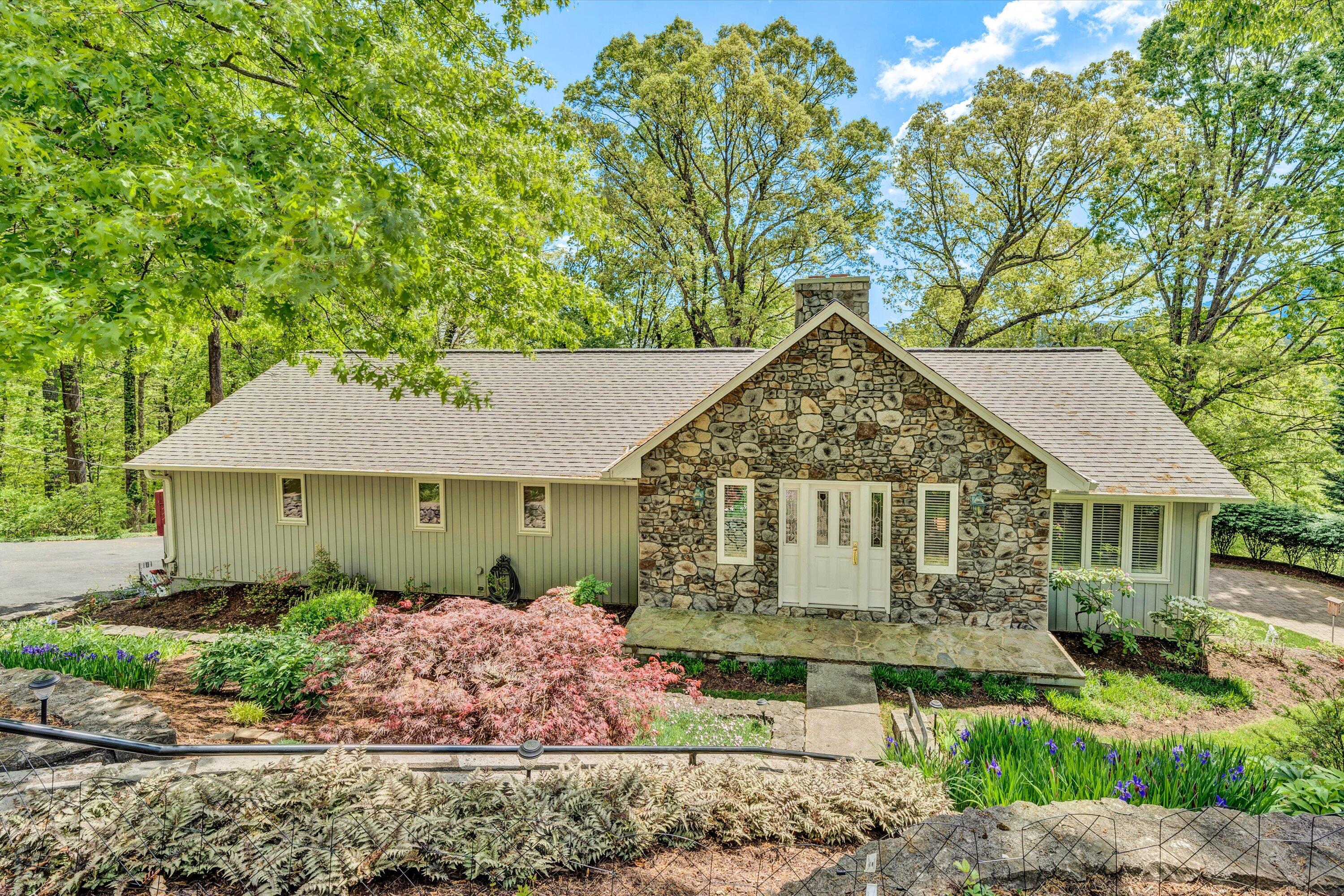2921 Lockridge Road Southwest Roanoke, VA 24014 - Photo 1 of 53 a front view of a house with garden