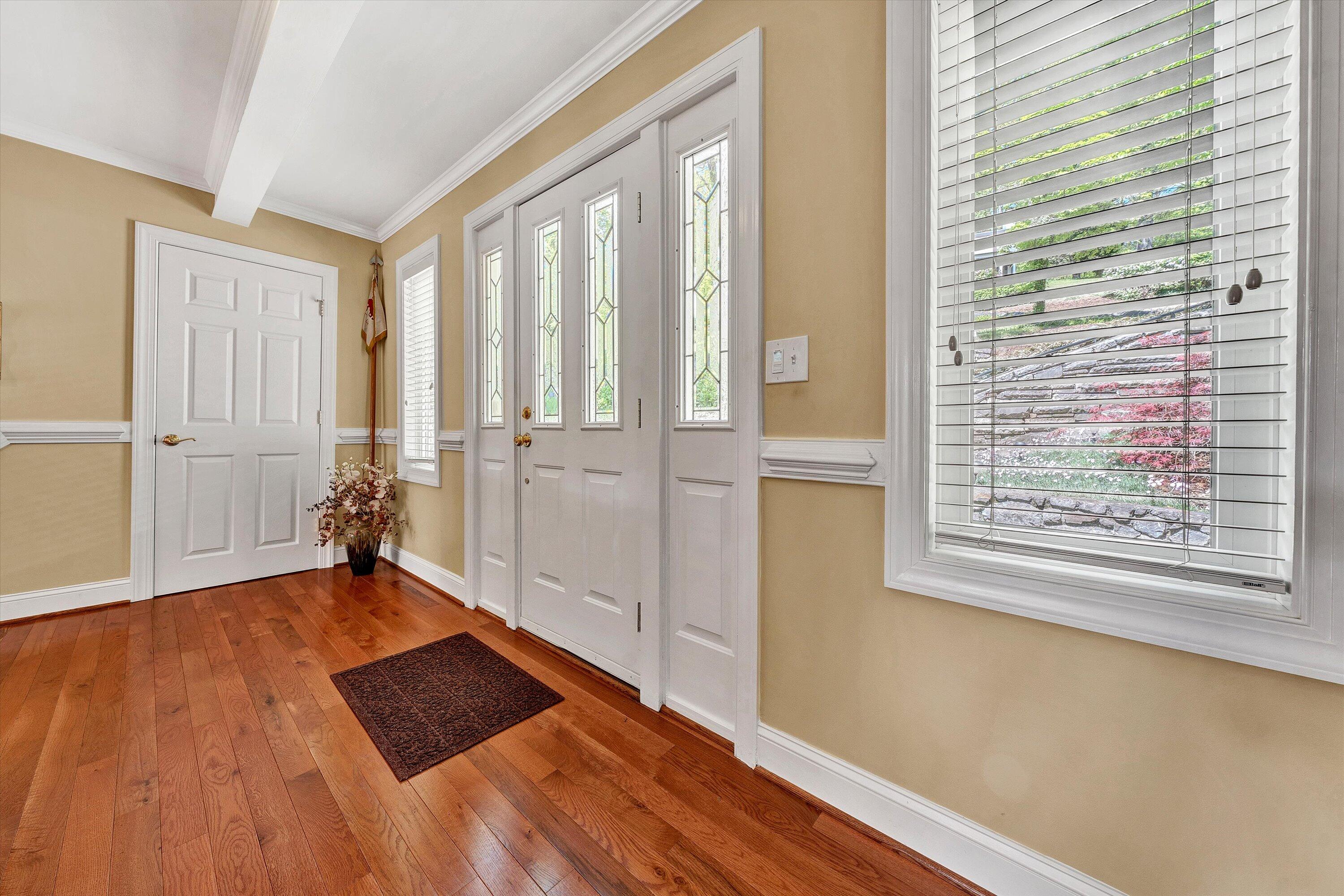 2921 Lockridge Road Southwest Roanoke, VA 24014 - Photo 8 of 53 a view of an empty room with wooden floor and a window