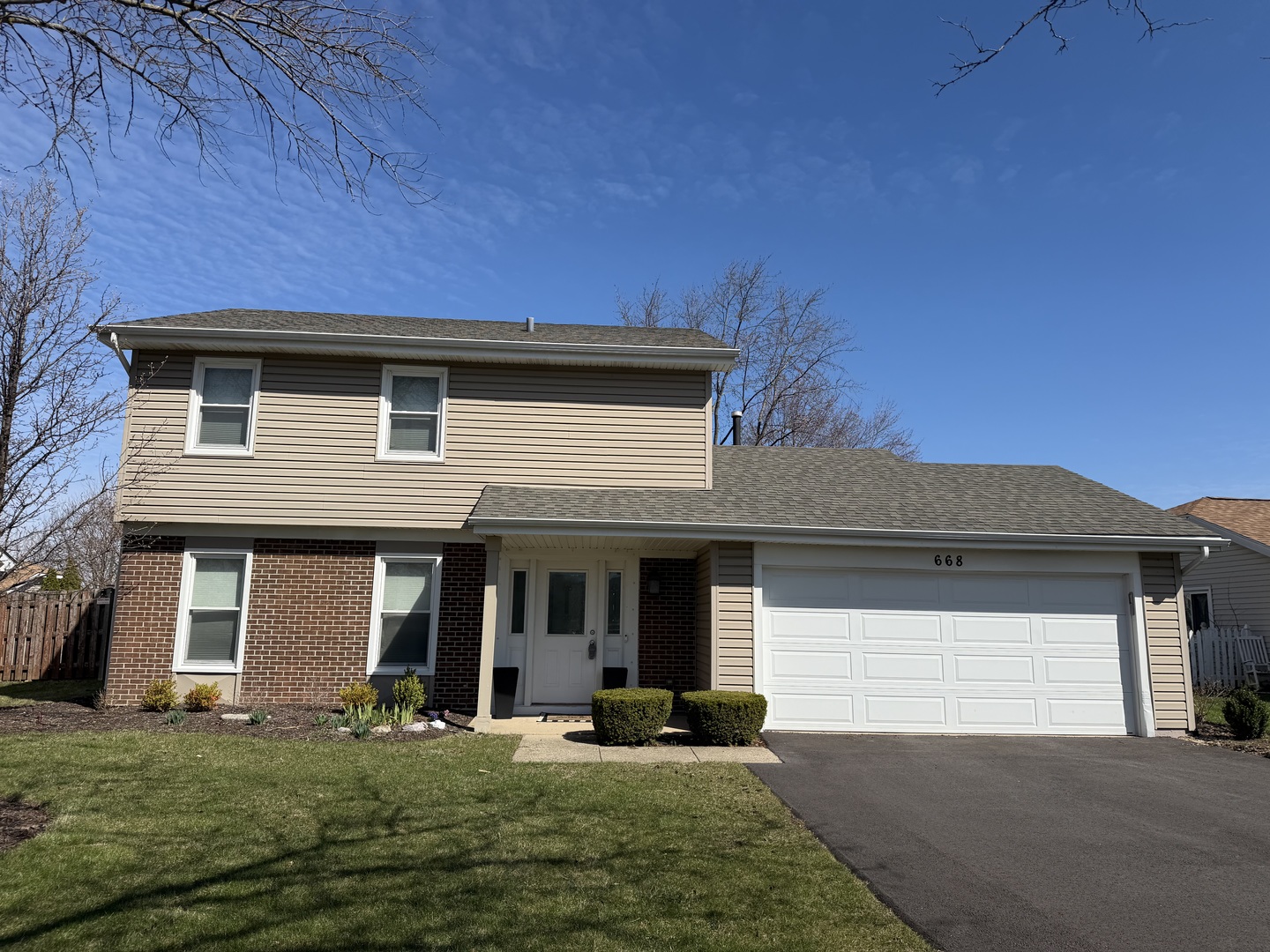 668 Niagara Drive Bolingbrook, IL 60440 - Photo 1 of 1 a front view of a house with a yard