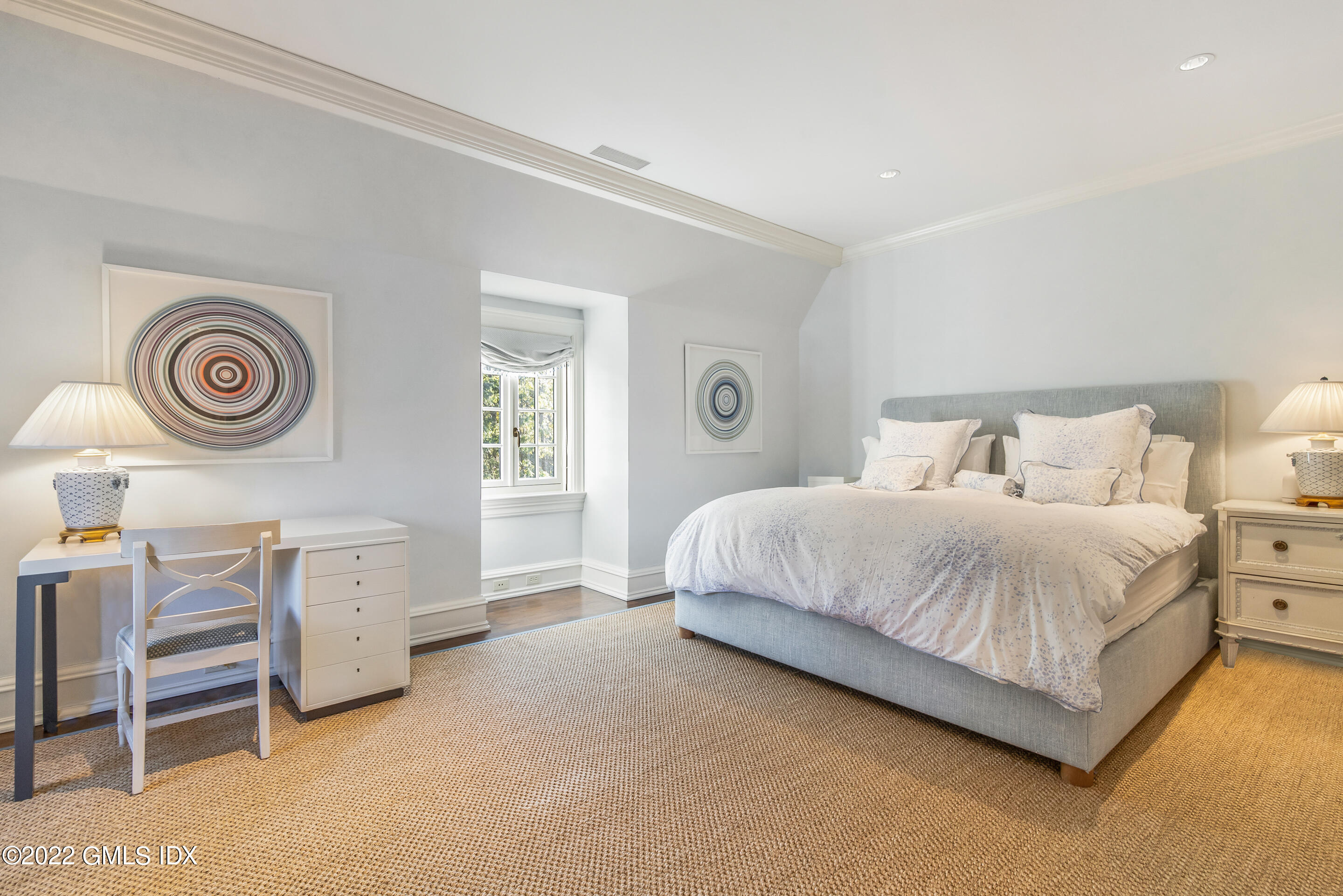 266 Round Hill Road Greenwich, CT 06831 - Photo 23 of 27 a bedroom with a bed and a cabinets