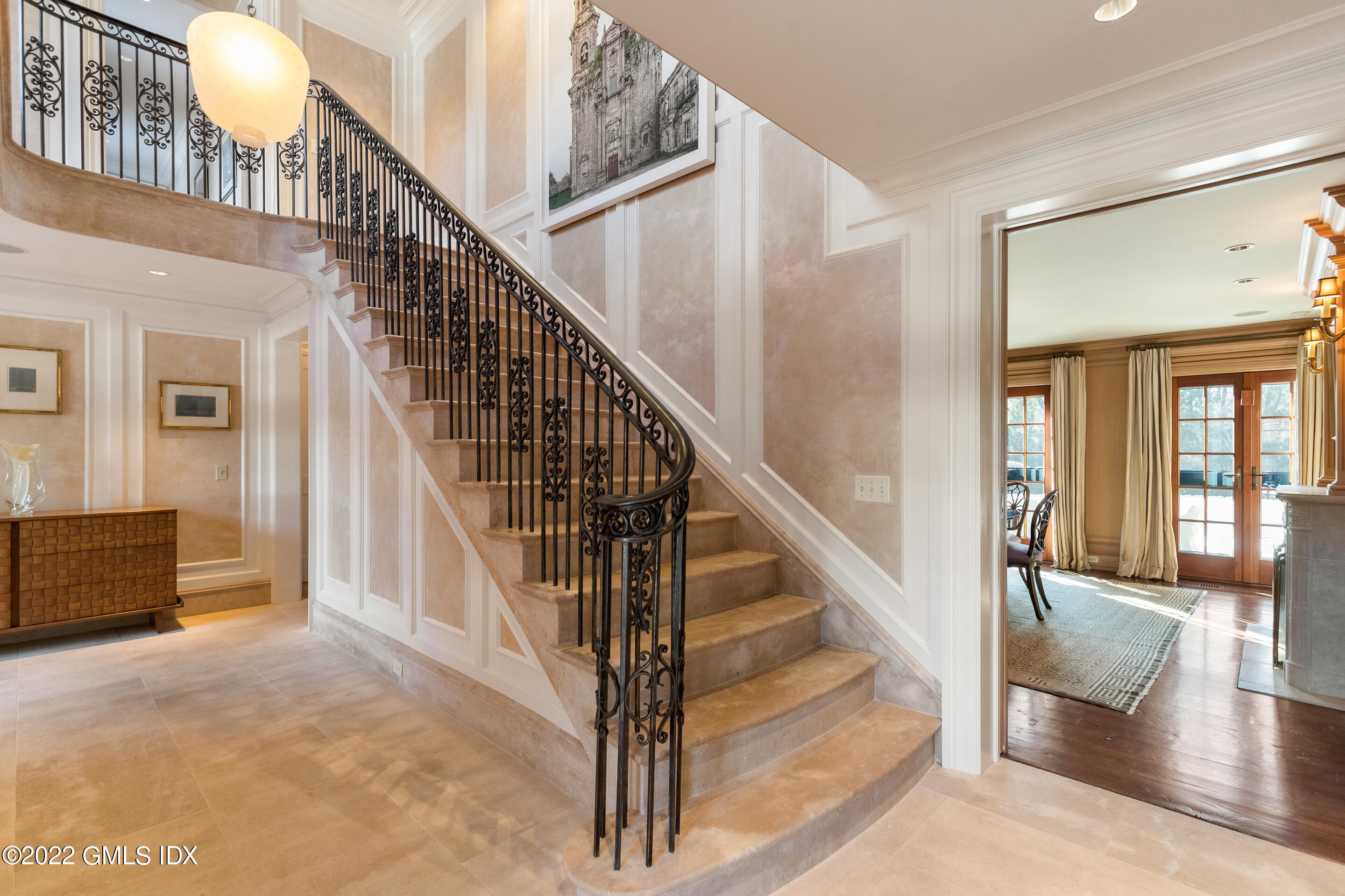 266 Round Hill Road Greenwich, CT 06831 - Photo 6 of 27 a view of staircase with wooden floor and a rug