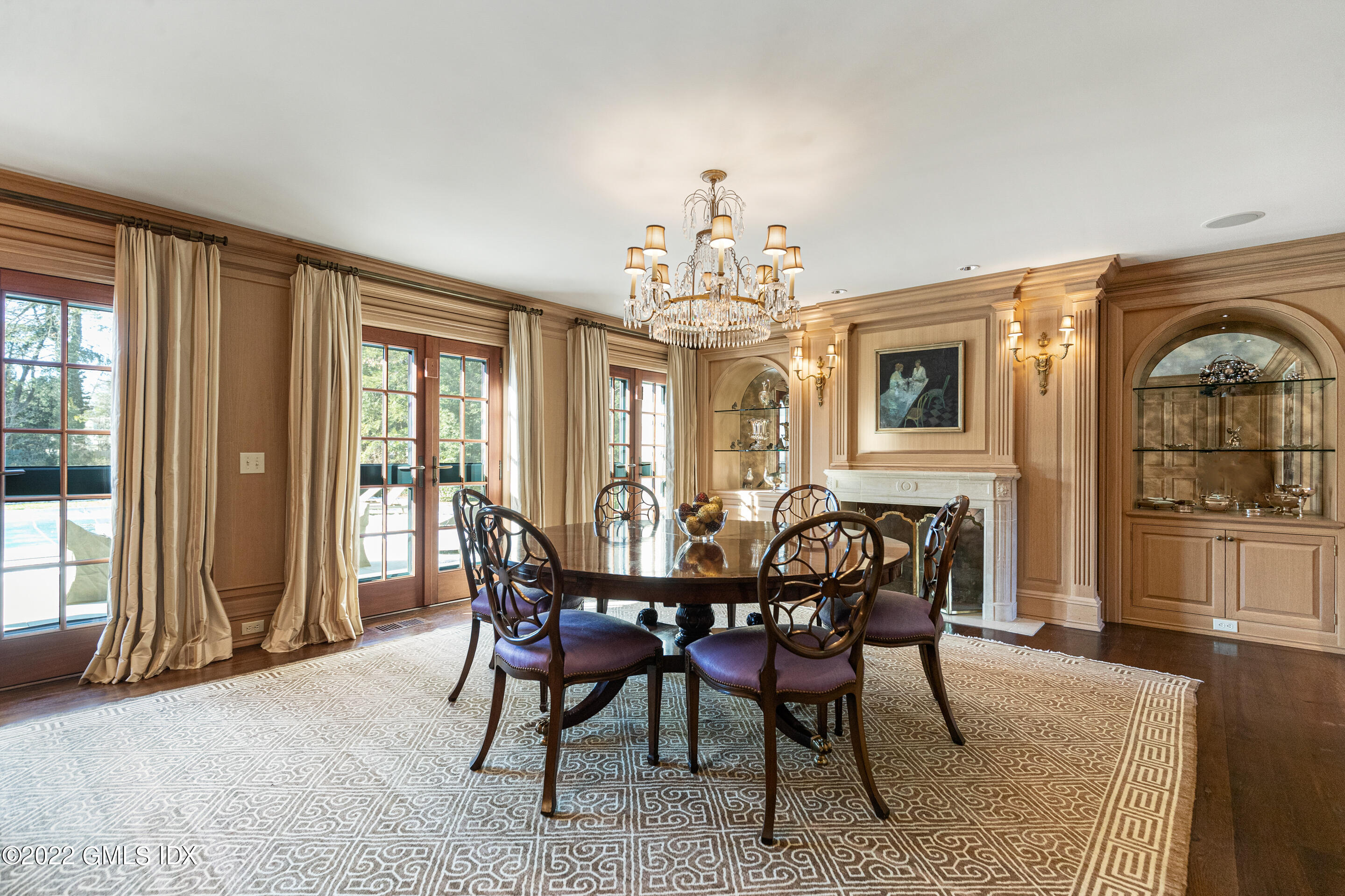 266 Round Hill Road Greenwich, CT 06831 - Photo 7 of 27 a view of a dining room with furniture window and wooden floor