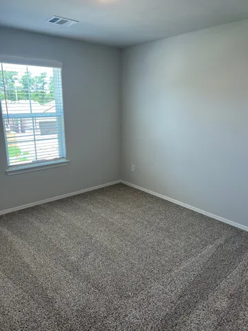 an empty room with closet