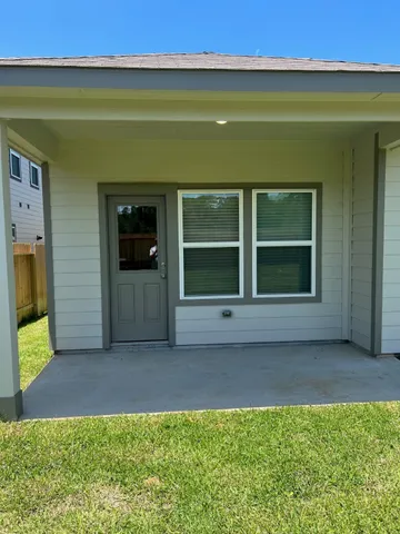 a view of a yard with an outdoor space