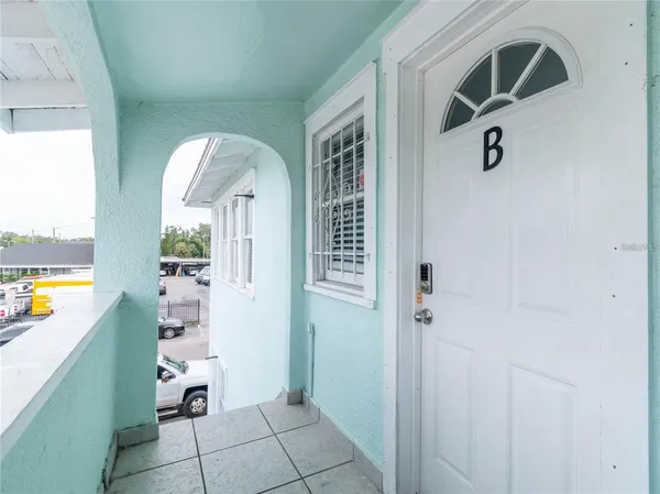 a view of an entryway with sitting area