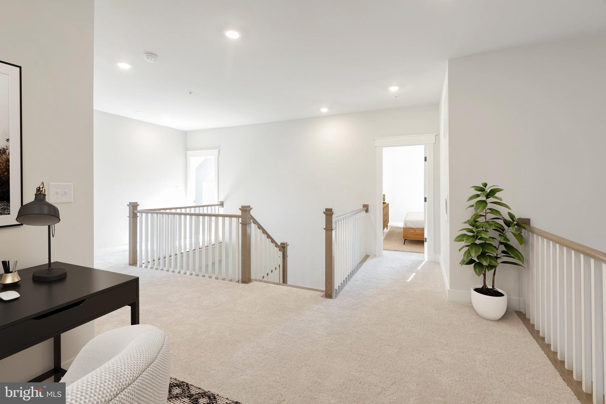11310 Eliana Court Laurel, MD 20708 - Photo 26 of 48 a living room with furniture and flowers
