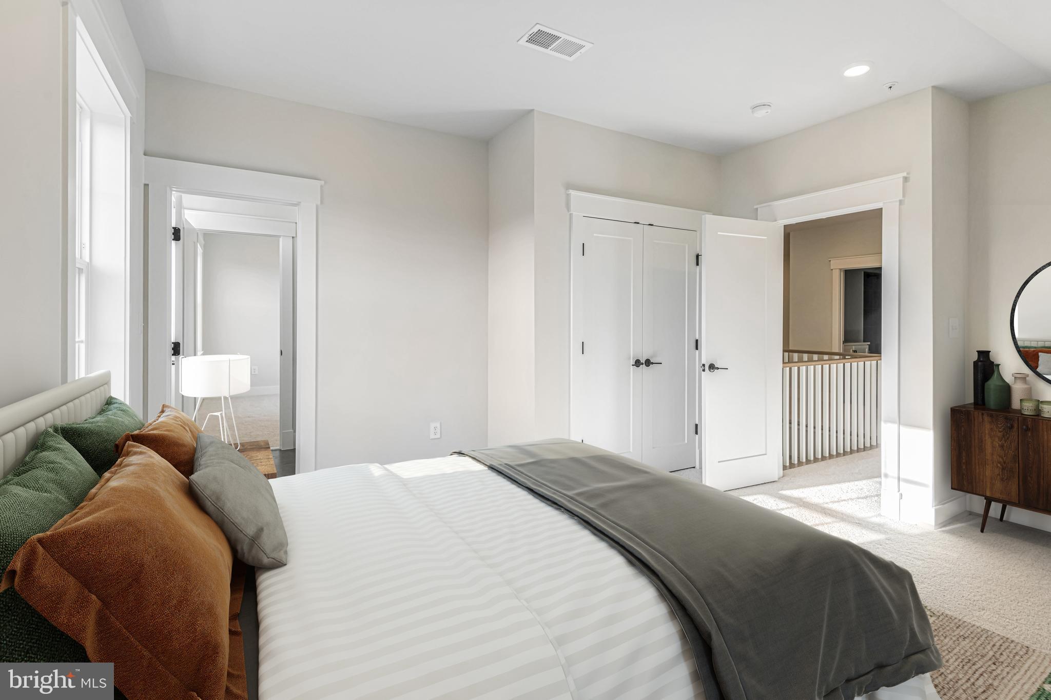 11310 Eliana Court Laurel, MD 20708 - Photo 33 of 48 a bedroom with bed and glass door