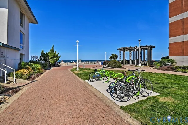 a view of a chairs and table in backyard