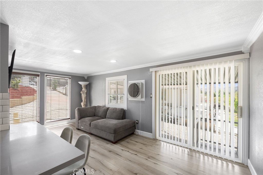 32857 Valley View Avenue Lake Elsinore, CA 92530 - Photo 3 of 12 a living room with furniture and a large window