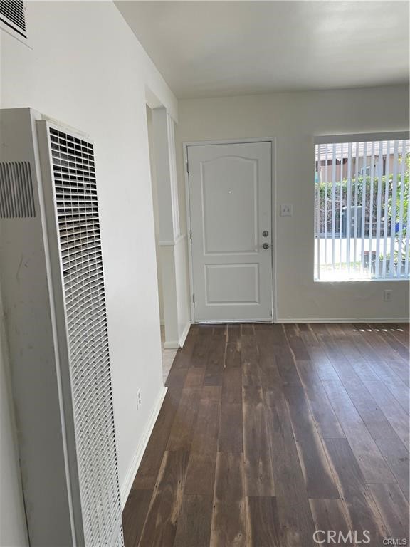 2738 Southern, Unit B South Gate, CA 90280 - Photo 12 of 19 a view of a livingroom with wooden floor and window