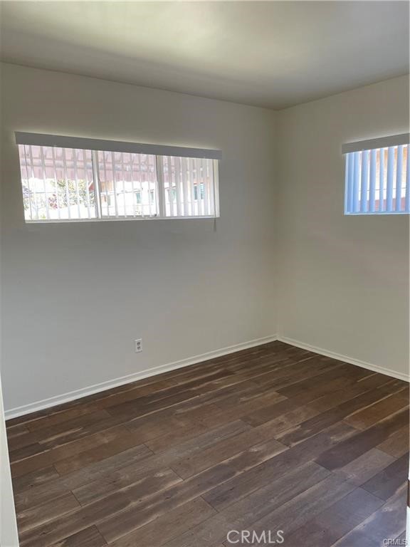 2738 Southern, Unit B South Gate, CA 90280 - Photo 18 of 19 a view of empty room with wooden floor and fan