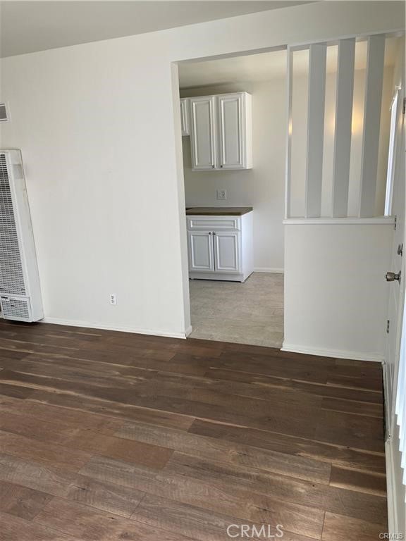 2738 Southern, Unit B South Gate, CA 90280 - Photo 7 of 19 a view of an empty room and wooden floor