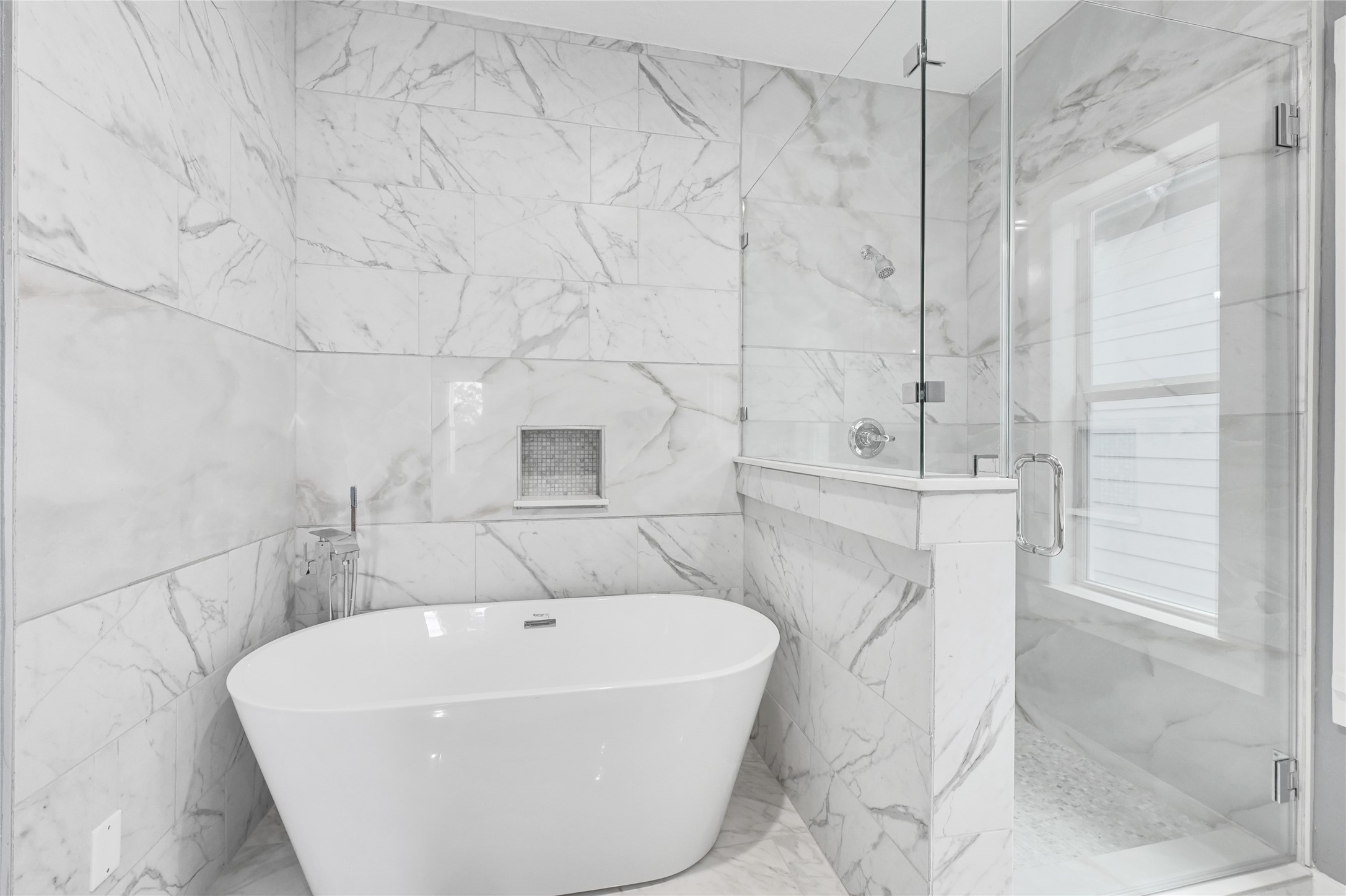 4304 New Orleans Street Houston, TX 77020 - Photo 15 of 23 a bathroom with a bathtub and shower