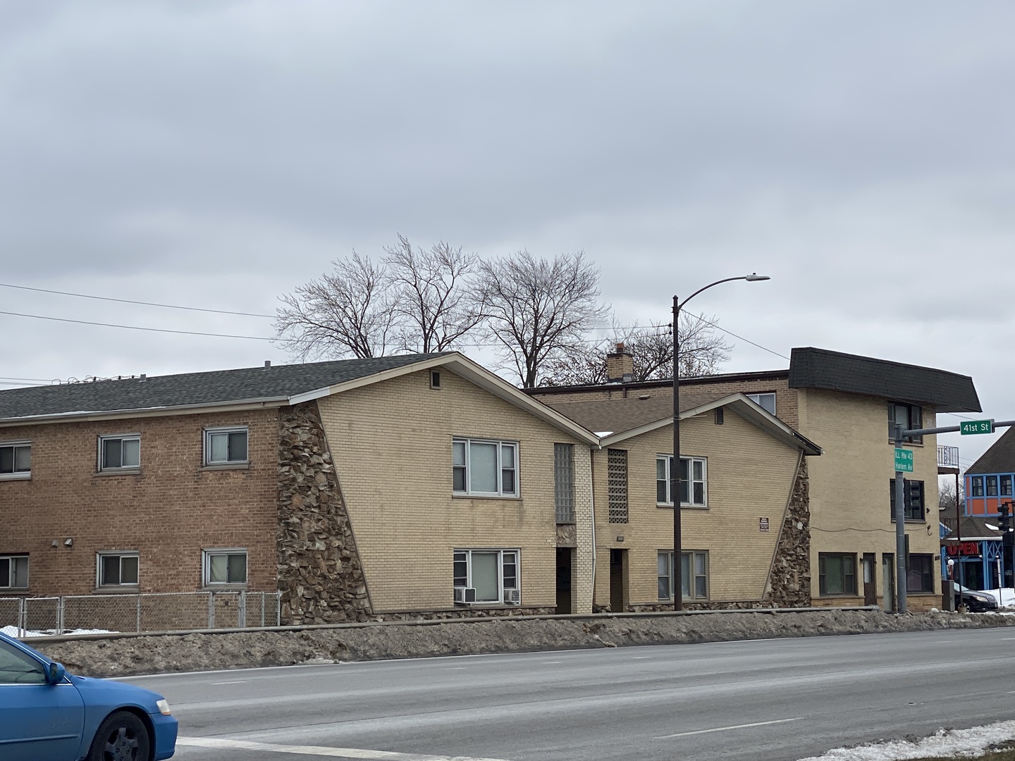 4041 South Harlem Avenue, Unit 3 Stickney, IL 60402 - Photo 1 of 12 front view of a house with a street