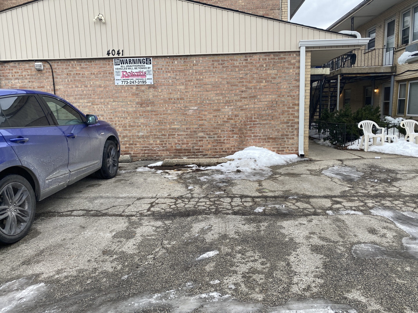 4041 South Harlem Avenue, Unit 3 Stickney, IL 60402 - Photo 11 of 12 a car parked in front of a building