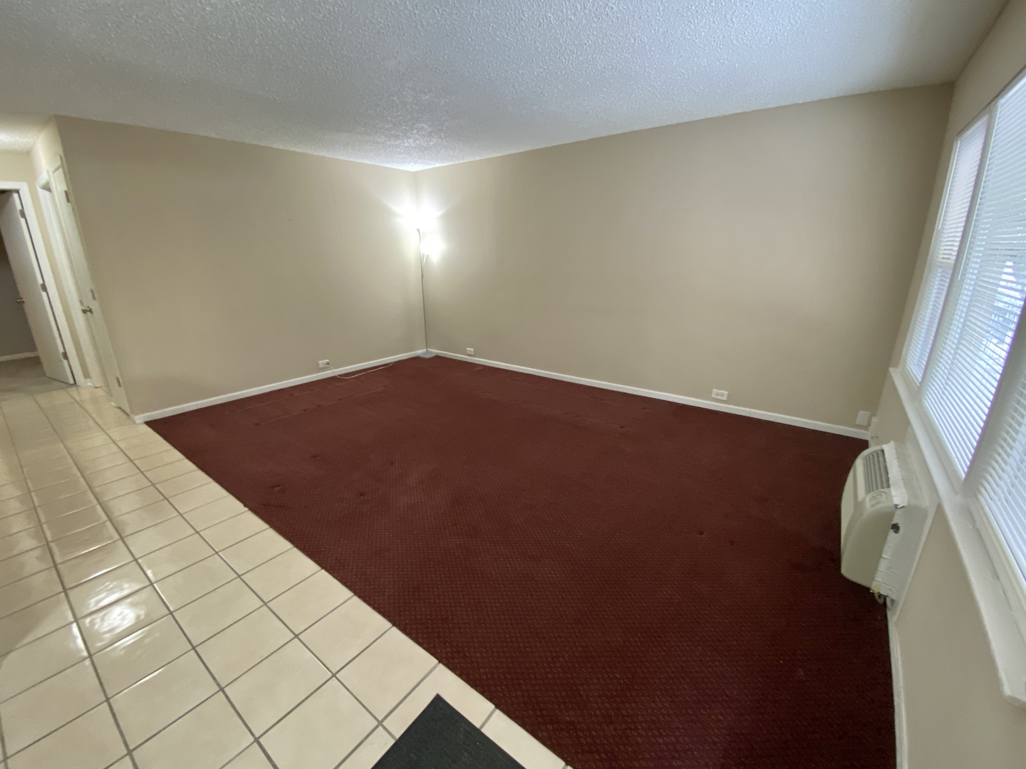4041 South Harlem Avenue, Unit 3 Stickney, IL 60402 - Photo 4 of 12 an empty room with wooden floor