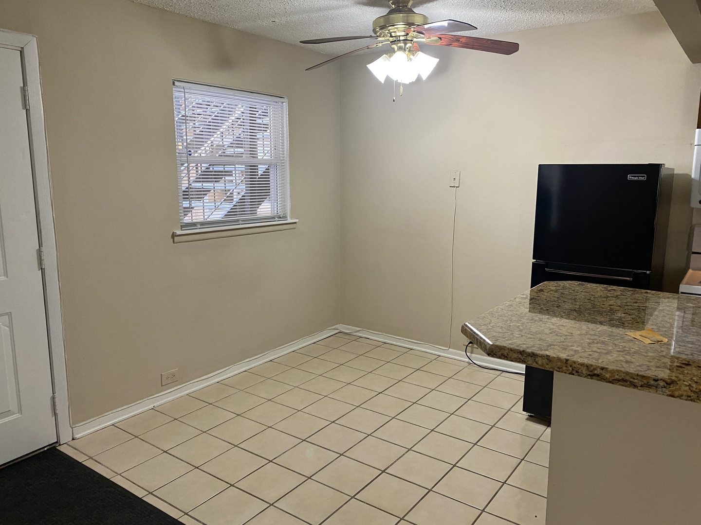 4041 South Harlem Avenue, Unit 3 Stickney, IL 60402 - Photo 6 of 12 a living room with a flat screen tv