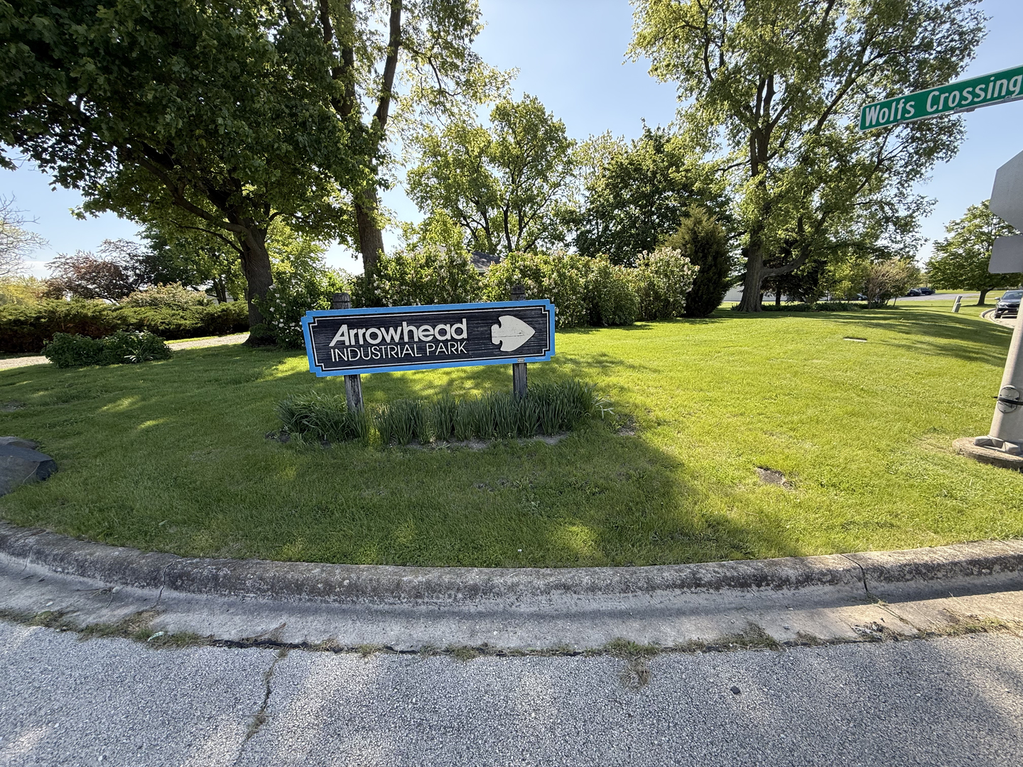 25501 West Wolfs Road Plainfield, IL 60585 - Photo 18 of 22 a sign that is on the side of the road